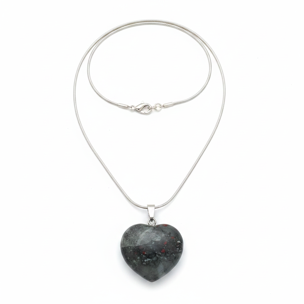 Green African Bloodstone heart pendant with chain on a white background