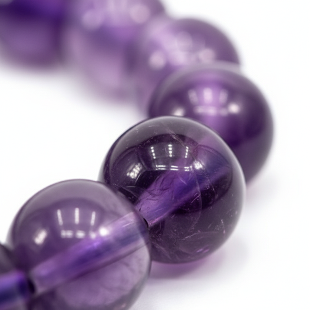 Close-up view of purple Amethyst beads on the large 8.5-inch bracelet
