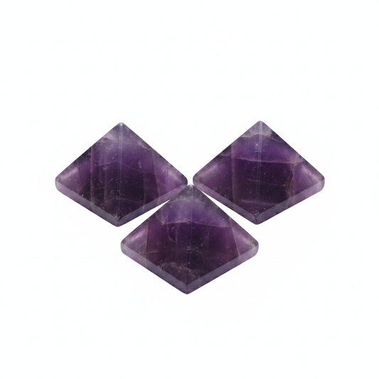 Polished Amethyst Pyramid, approximately 25–30mm, on a white background