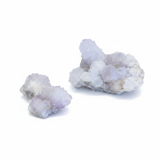 Natural Amethyst Spirit Quartz cluster with sparkling points on a clean light background