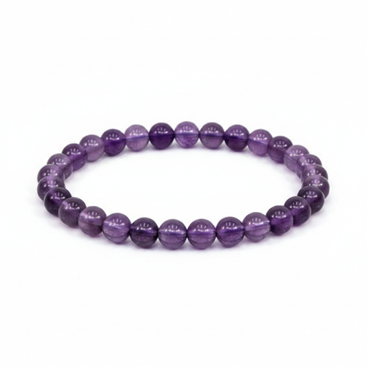 Amethyst 8mm beaded bracelet on white background — translucent violet and purple natural stone crystal bracelet by Prana Blessings