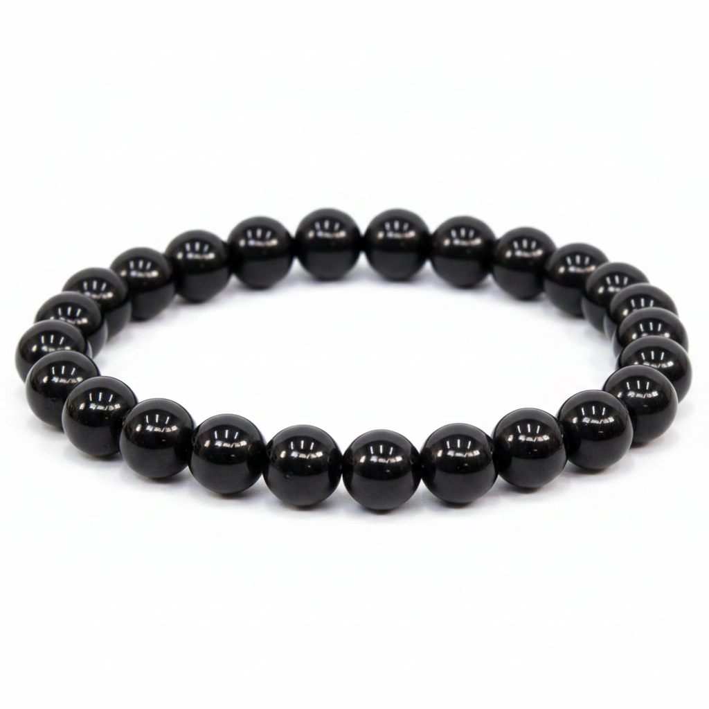 Large Black Obsidian 8.5-inch beaded bracelet on white background — glossy jet black volcanic glass crystal bracelet by Prana Blessings