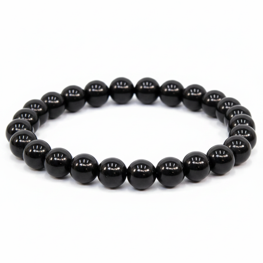Large Black Obsidian 8.5-inch beaded bracelet on white background — glossy jet black volcanic glass crystal bracelet by Prana Blessings