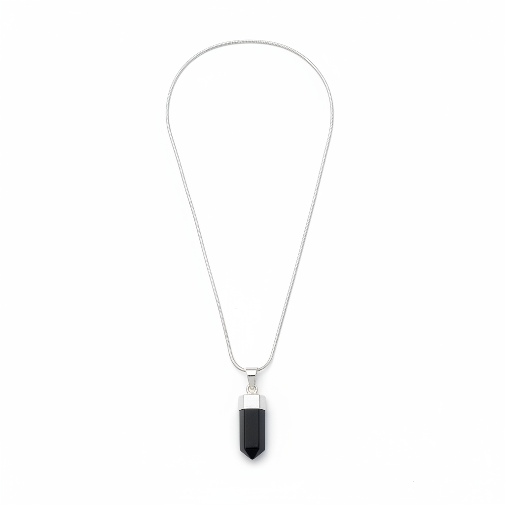 Polished Black Tourmaline pendant with silver-tone bail on a white background