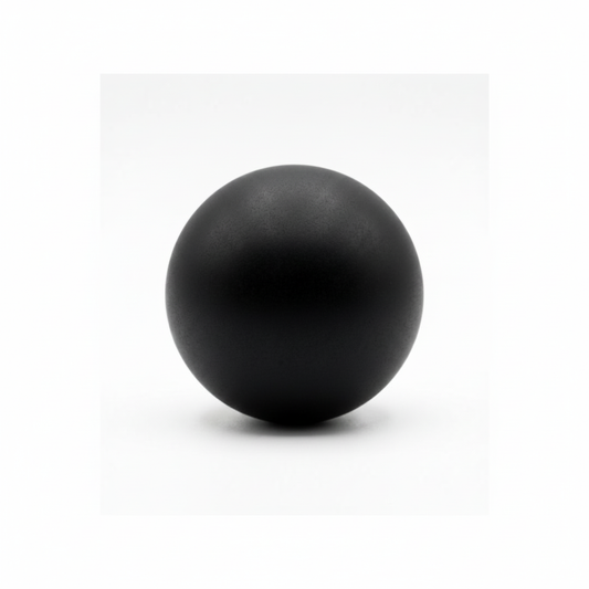 Polished 40mm Black Tourmaline sphere on a clean light background
