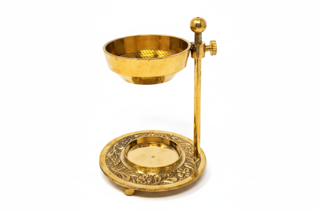 Brass tea-light resin burner with perforated bowl and decorative base