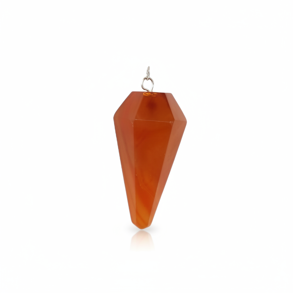 Natural Carnelian crystal pendulum on a white background