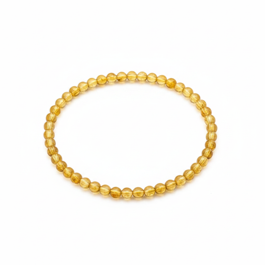 Citrine 4mm beaded stretch bracelet on a white background