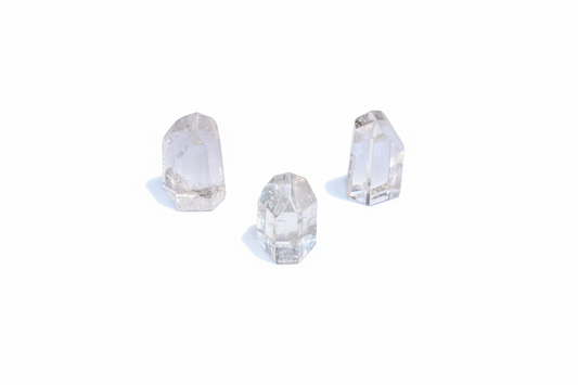 Clear Quartz Points 1" - 2" shown on a clean light background