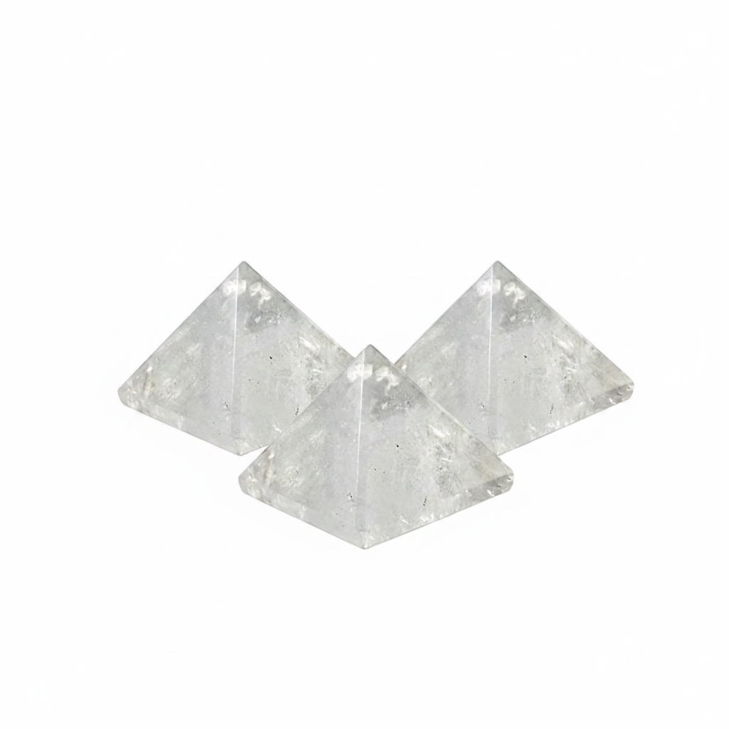 Polished Clear Quartz Pyramid, approximately 25–30mm, on a white background