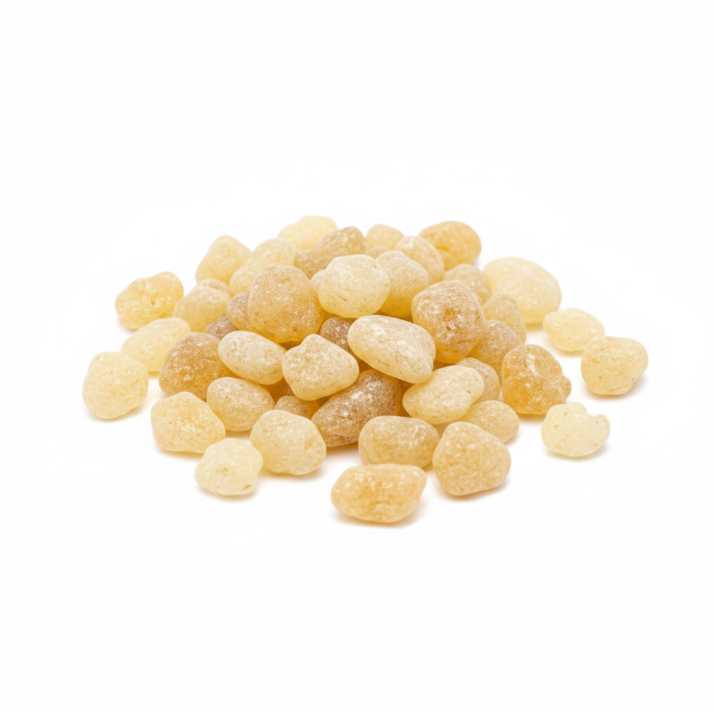 Copal Oro gold resin pieces on a white background