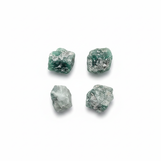 Emerald - Rough natural crystal shown on a clean light background