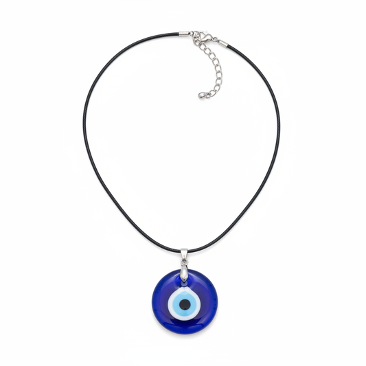 Blue and white glass Evil Eye pendant with chain on a white background