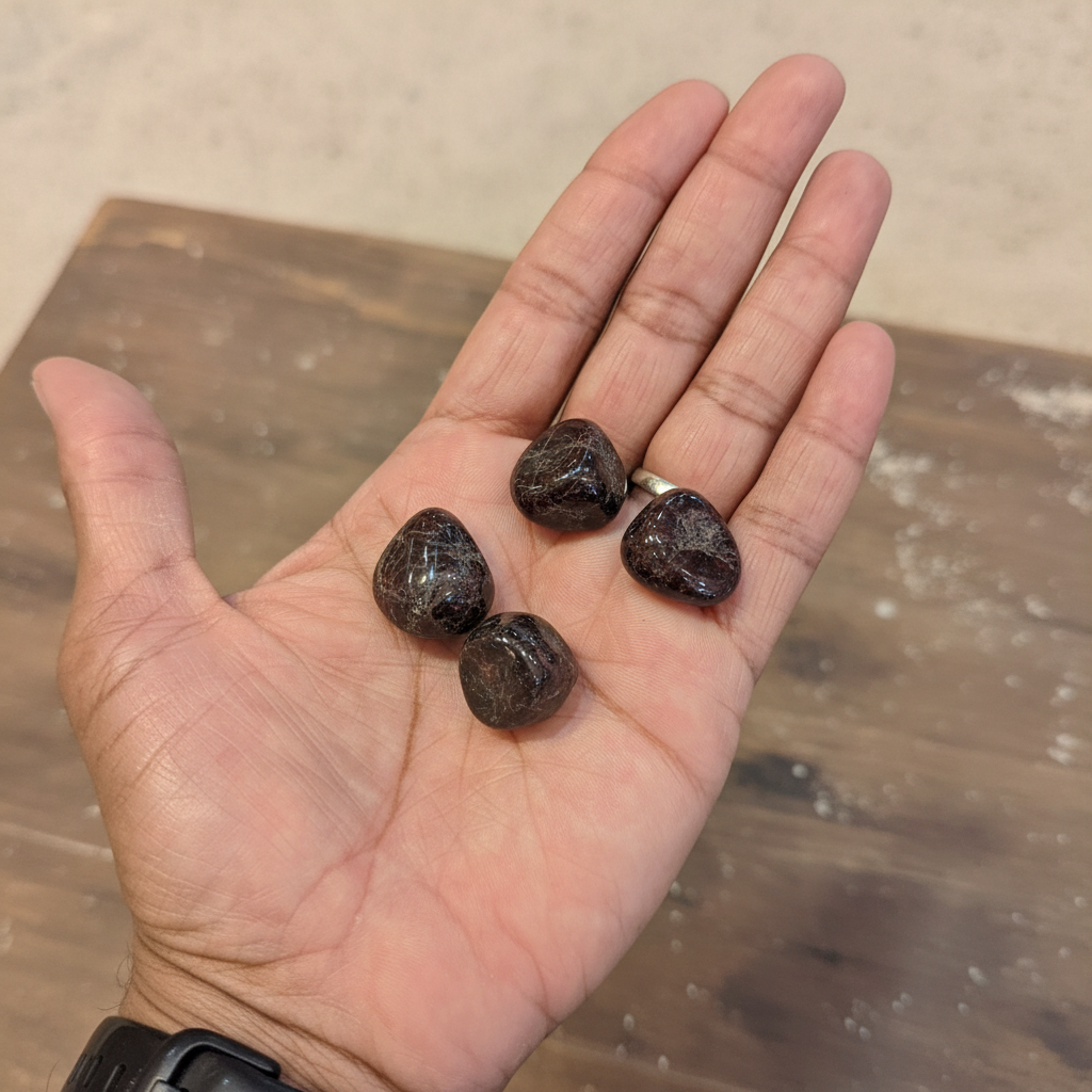 Garnet Tumbled Stones displayed in a calm lifestyle setting for scale and styling inspiration.