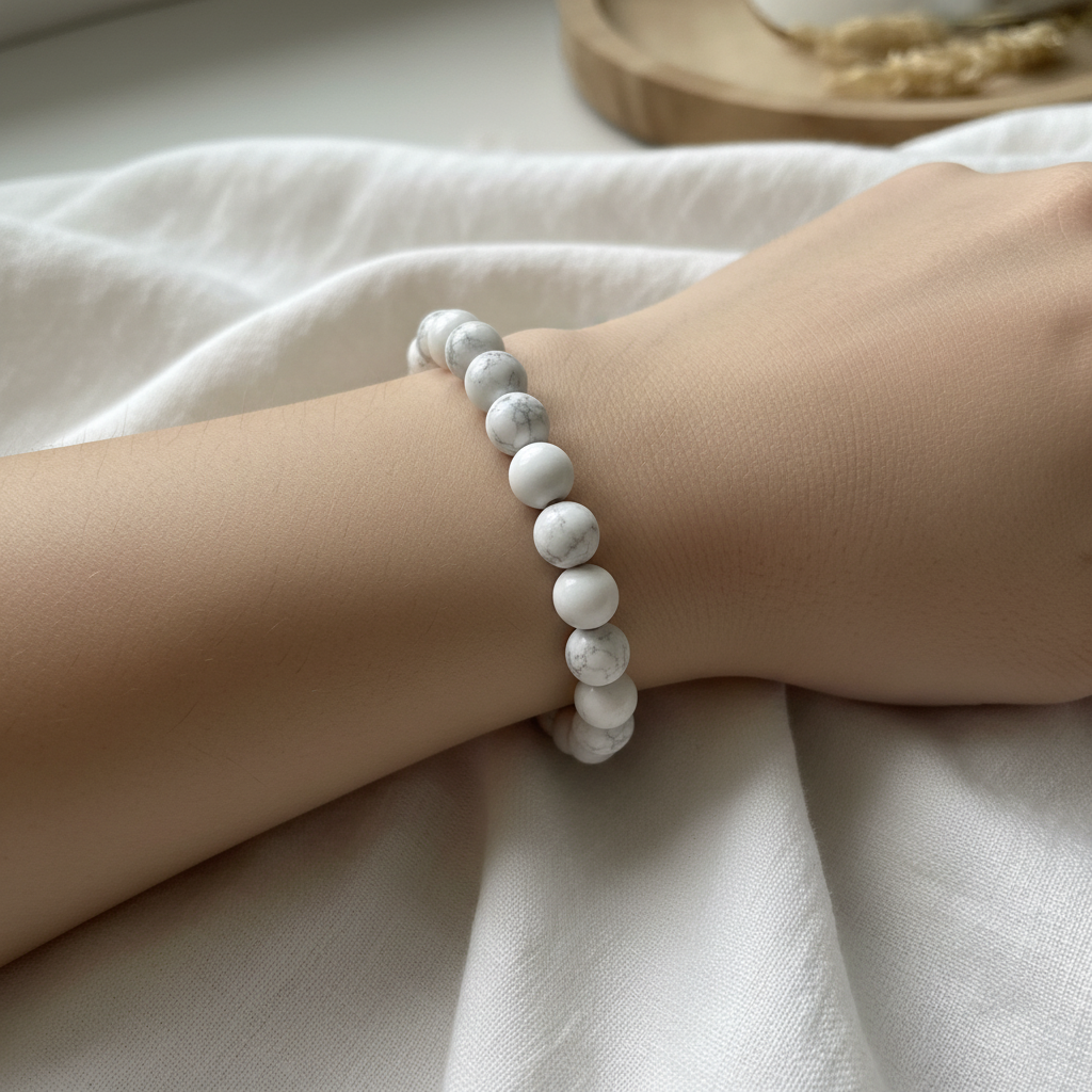 Howlite 8mm stretch bracelet displayed in a calm lifestyle setting