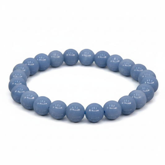Angelite 8mm beaded bracelet on white background — soft powder blue natural stone crystal bracelet by Prana Blessings