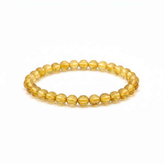 Citrine 4mm beaded bracelet on white background — delicate warm golden yellow translucent natural stone crystal bracelet by Prana Blessings