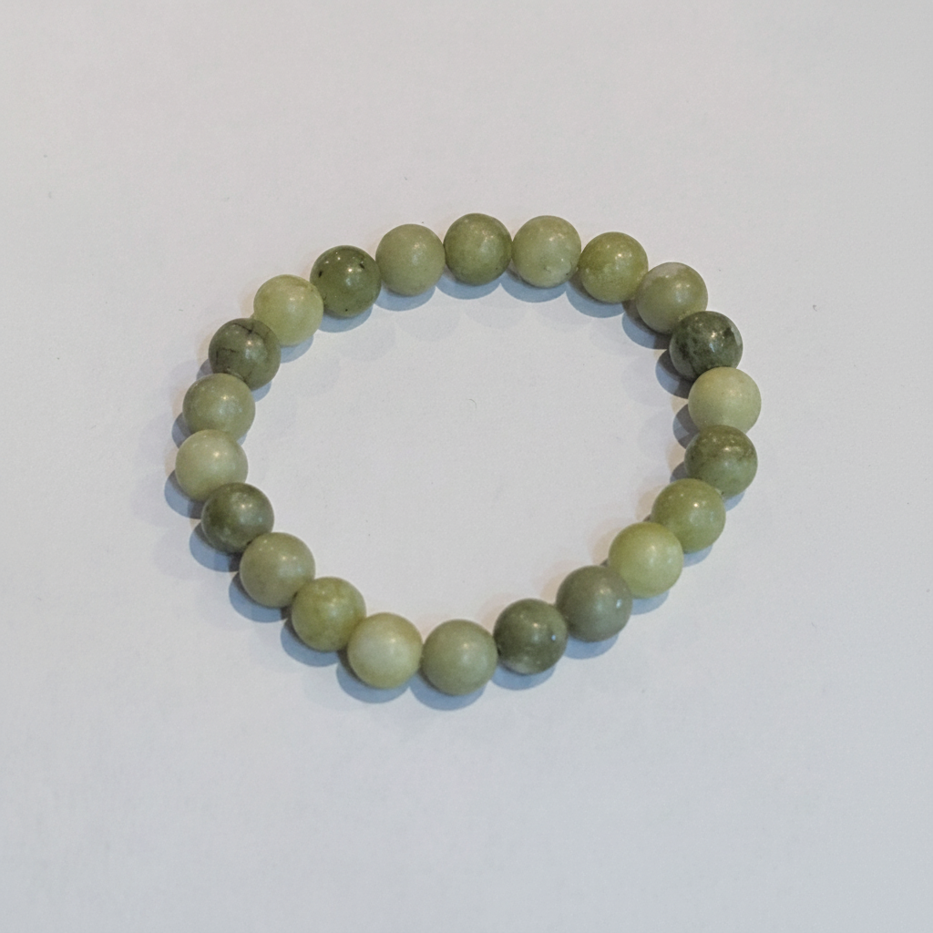 Green Nephrite Jade 8mm stretch bracelet on a white background