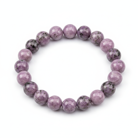 Natural Lepidolite 8mm stretch bracelet with lavender and purple beads on a white background