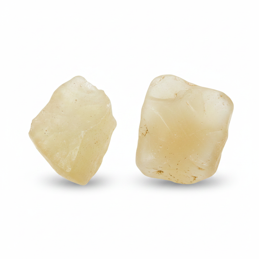 Libyan Desert Glass natural crystal shown on a clean light background