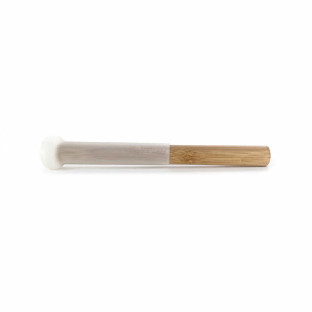 Included bamboo and silicone crystal singing bowl mallet on white background