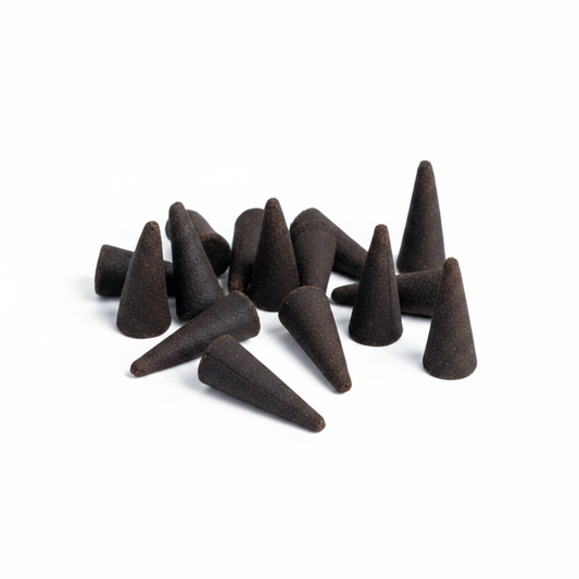 Nag Champa hand-dipped incense cones on a white background