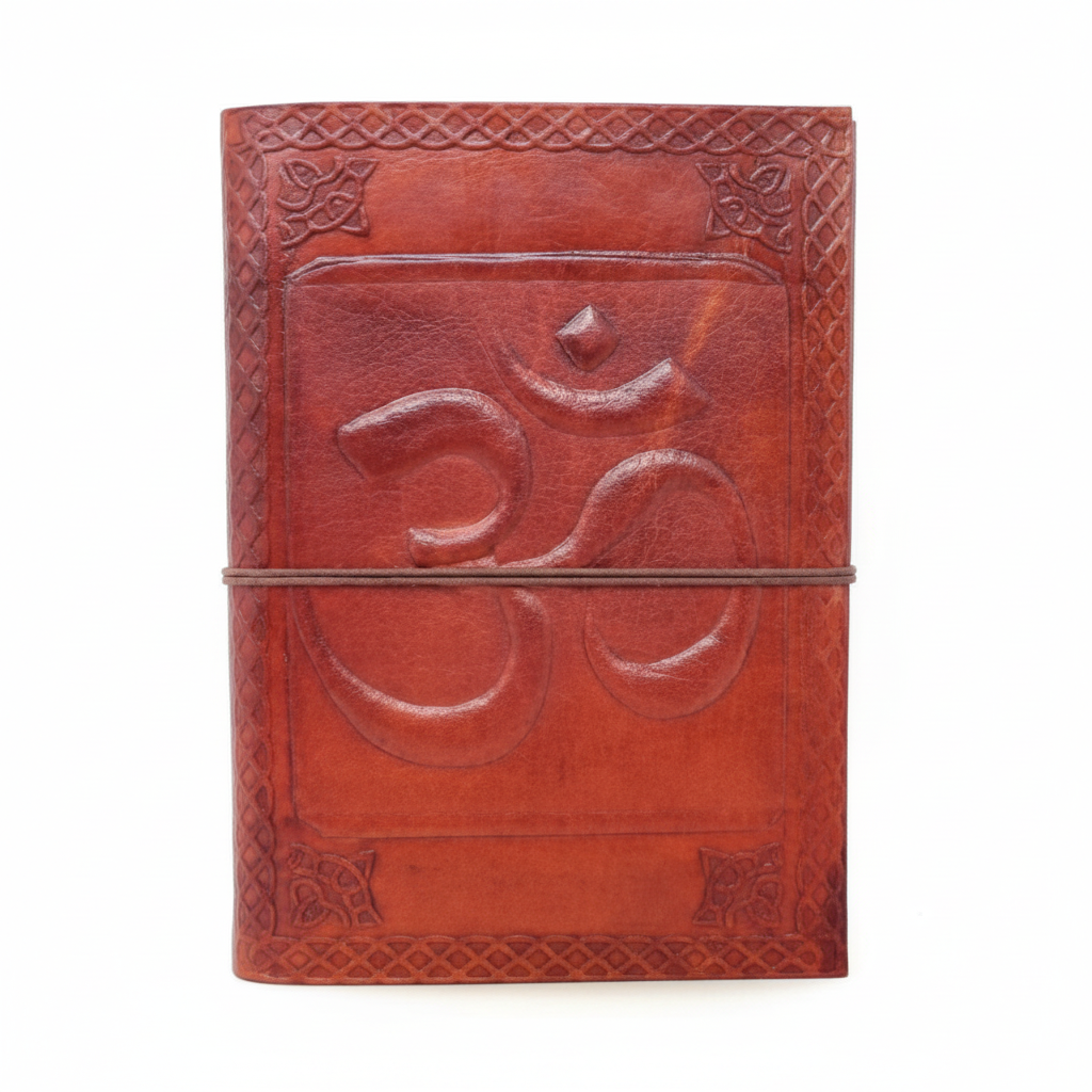 Brown leather journal with embossed Om design and cord closure on a white background