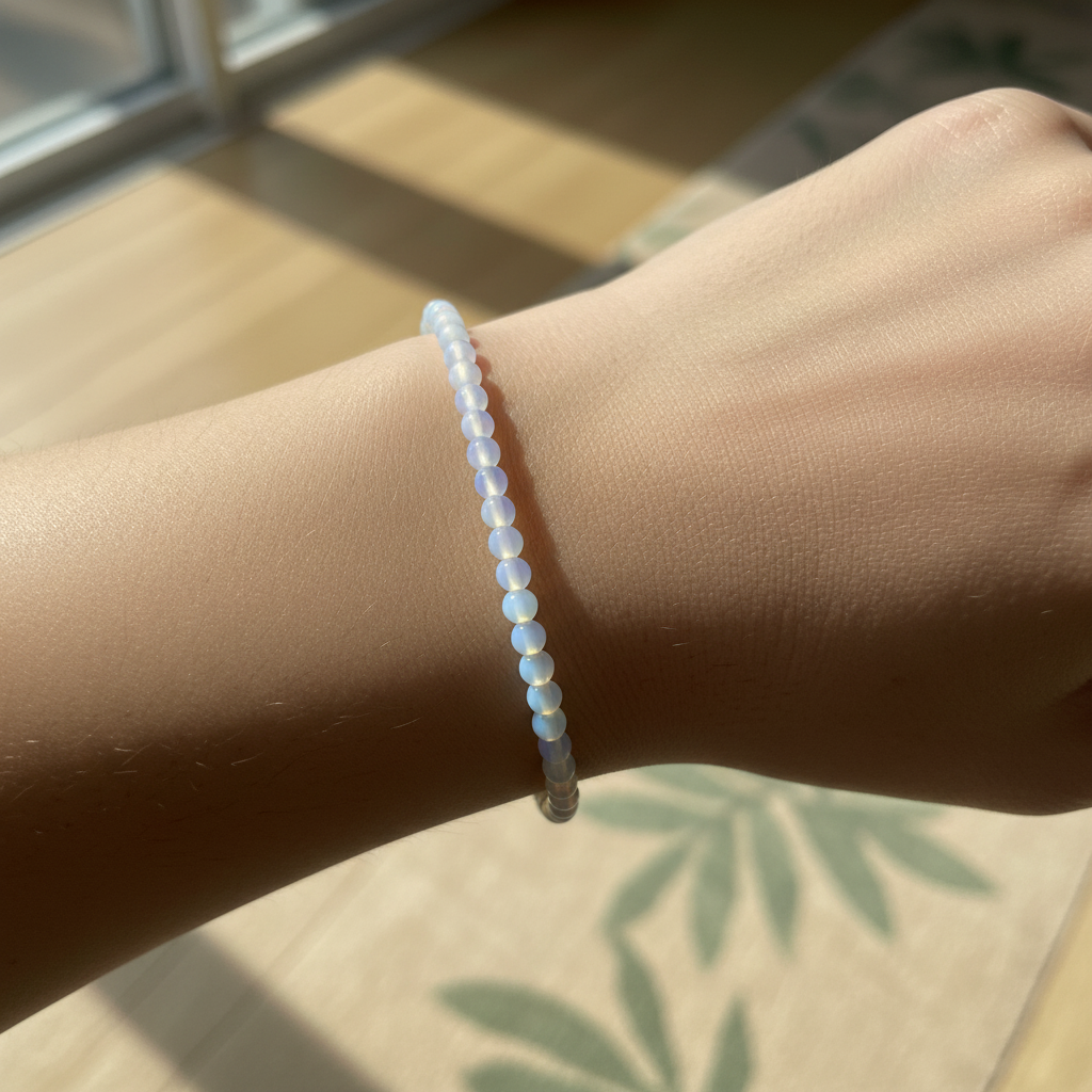 Opalite 4mm beaded bracelet styled in a calm lifestyle setting