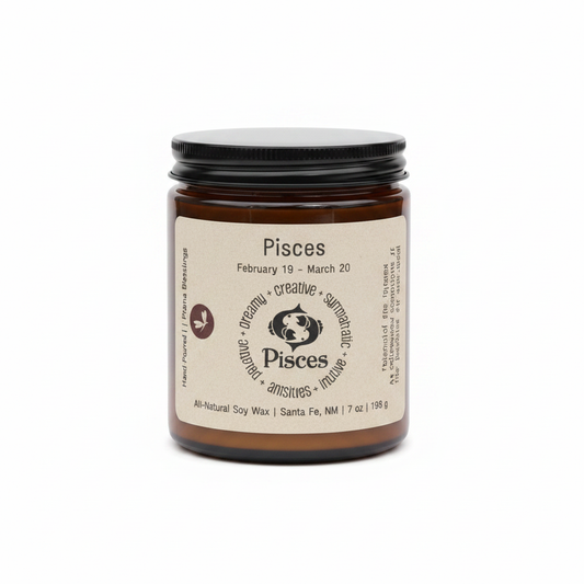 Pisces Zodiac Candle in an amber 8 oz jar on a white background