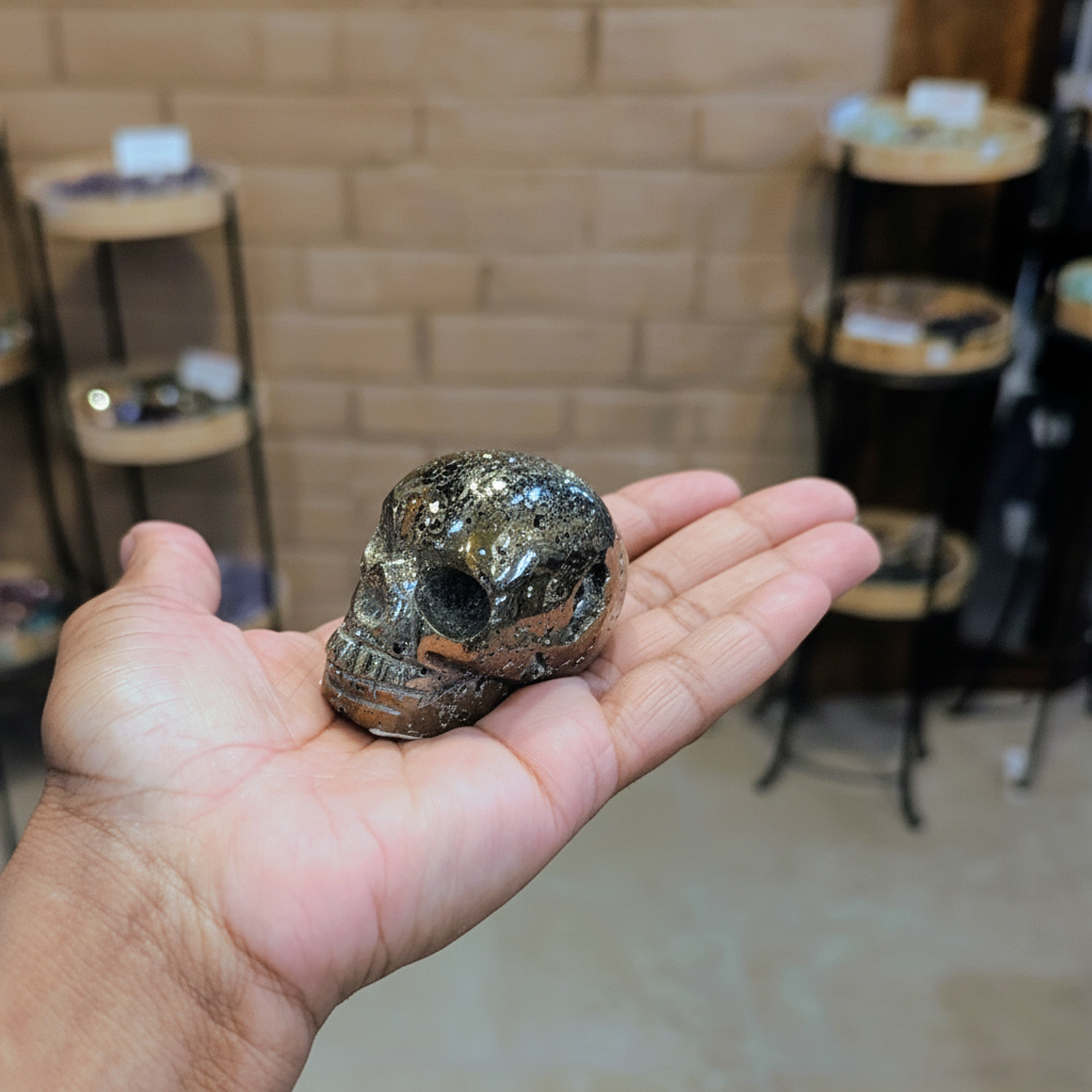 Pyrite Skull 2" natural crystal held in hand to show approximate scale
