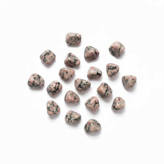 Rhodonite Tumbled Small shown clearly on a clean white background, highlighting its color, shape, and natural variation.