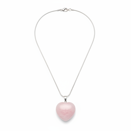 Pink Rose Quartz heart pendant on a white background