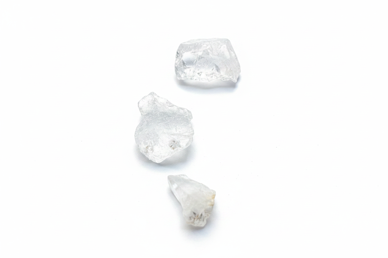 Rough Clear Quartz Chunks shown on a clean light background