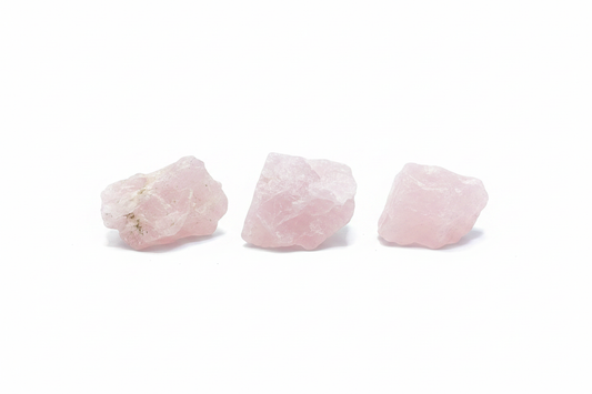 Rough Rose Quartz Chunks shown on a clean light background