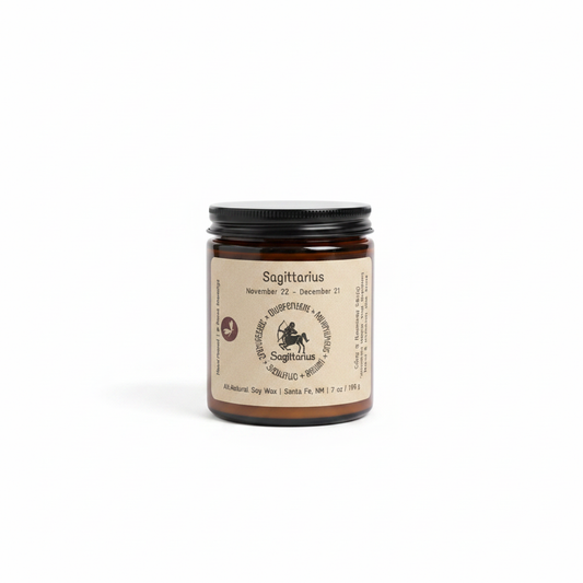 Sagittarius Zodiac Candle in an amber jar on a white background