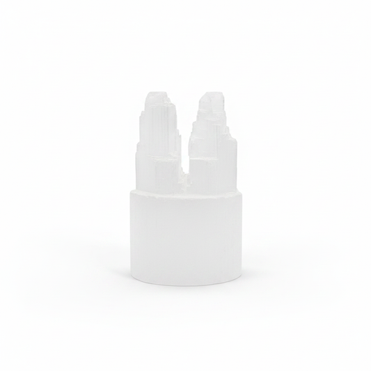 Carved white Selenite double tower with two points on a white background