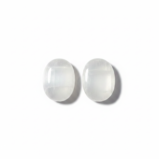 Selenite Soothing Stone shown clearly on a clean white background, highlighting its color, shape, and natural variation.