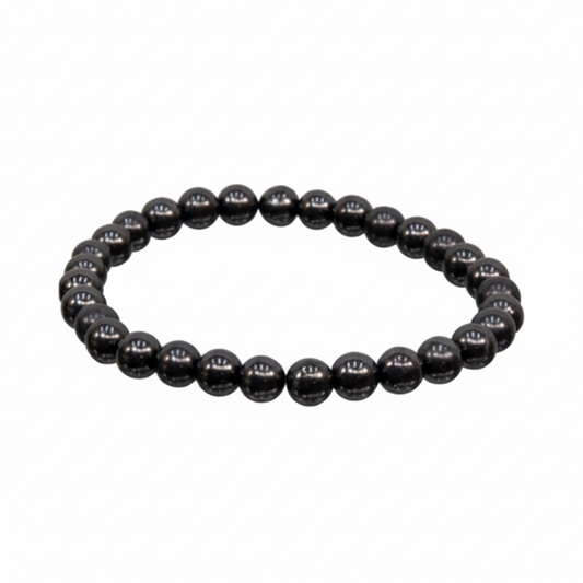 Shungite 8mm stretch bracelet with deep black natural stone beads on a white background