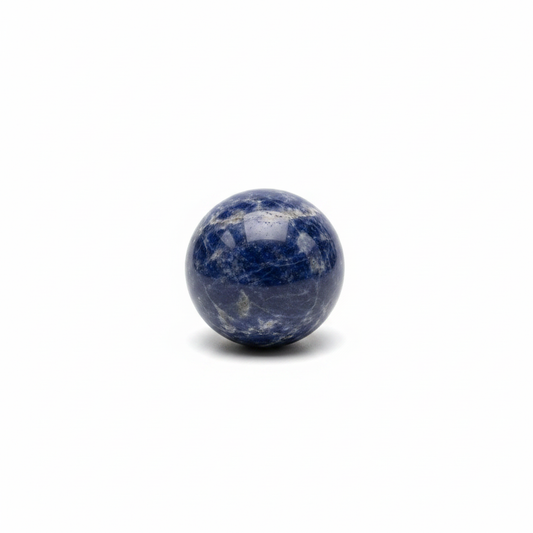Polished 40mm Sodalite sphere on a clean light background