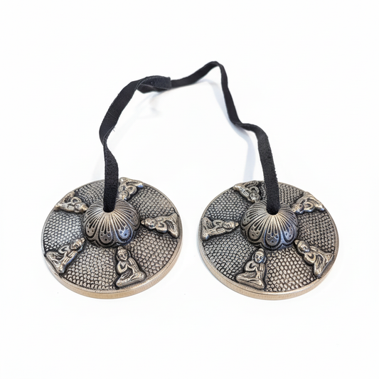 Pair of three-inch Tibetan-style cymbals with Buddha imagery